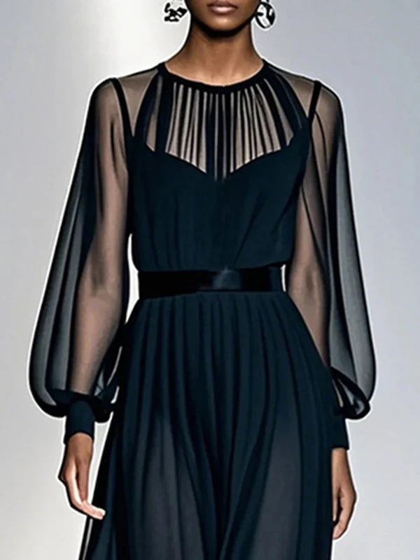 فستان طويل بأكمام منفوخة من الشاش